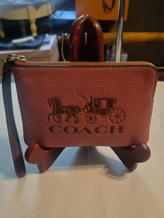 Coach Handbags - Coach Pebbled Leather Wristlet in Wine Red